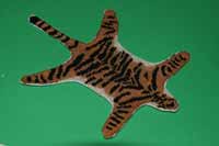 Broderad tiger matta